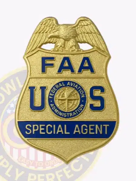 Alt text: Front view of a custom gold eagle top metal badge for FAA, the special agent with safety pin attachment, displaying a shiny gold eagle on top of a shield-shaped badge with bold blue "FAA U S" text and the official FAA seal, plus a blue banner stating "SPECIAL AGENT."