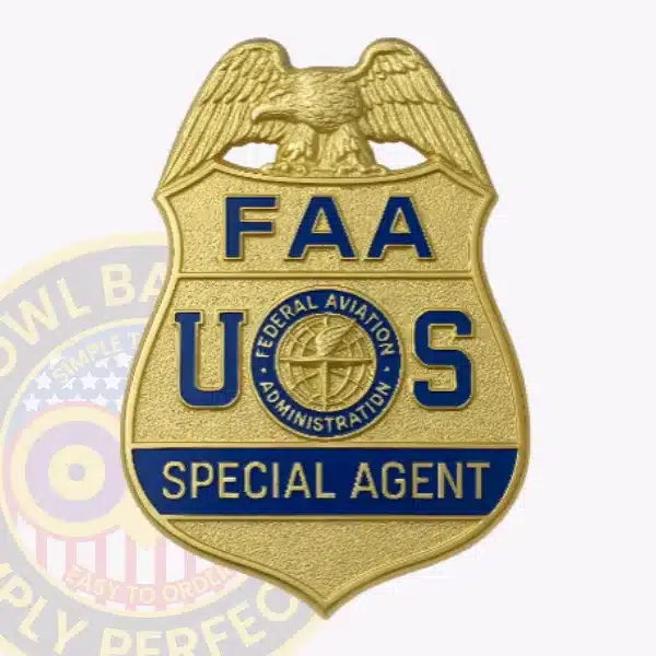 Alt text: A custom gold eagle top metal badge for FAA, the special agent with safety pin attachment, designed as a sturdy gold shield with detailed eagle wings spread at the top and clear blue lettering including "FAA U S," the FAA seal, and "SPECIAL AGENT" on a blue background.