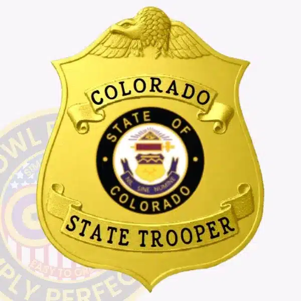 Bright gold custom metal badge for Colorado State Trooper featuring prominent eagle design at the top and official state seal in the center, equipped with safety pin attachment.