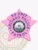 Close-up of a bright pink metal 5-point star badge for the Chicago Police K9 Unit, with blue lettering and the official Chicago city seal in the center, equipped with a safety pin for secure fastening.