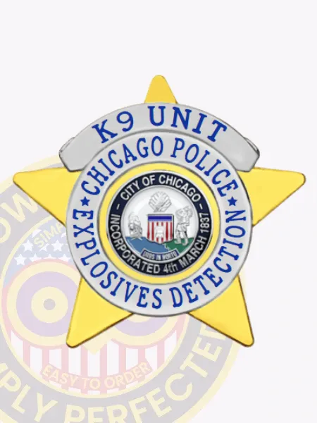 Gold custom 5-point star metal badge designed for Chicago Police K9 Unit Explosives Detection, featuring a silver top banner and circular border with blue lettering, including the City of Chicago seal in the center, attached by a safety pin.