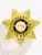 Close-up of a custom gold 7-point star badge for fugitive recovery agents, engraved with intricate patterns, Georgia state seal in the center, and ID number 12345, equipped with a safety pin attachment.