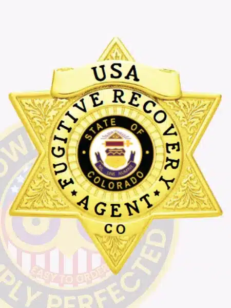 Gold metal 6-point star badge designed for Fugitive Recovery Agents, displaying the State of Colorado seal in the center. The badge is inscribed with 'USA Fugitive Recovery Agent CO' around the seal and has a safety pin fastening.