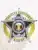 Detailed silver metal badge in the shape of a 5-point star with a gold banner behind, designed for Fugitive Recovery Agents. The badge includes the name Simon K., safety pin fastening, and a central seal showing the U.S. Bail Enforcement logo with stars and flags.