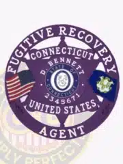 Purple 6-point star metal badge designed for Fugitive Recovery Agents for Domestic Violence Awareness, displaying the Connecticut state seal in the center. The badge includes American and Connecticut flags, personalized with D. Bennett and agent ID 2345671, surrounded by a circular banner and equipped with a safety pin attachment.