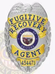 Silver eagle-top badge with gold decorative panels for Fugitive Recovery Agent, displaying the Arizona state seal in the center, bold blue text for "Fugitive Recovery Agent," unique number 454471 at the bottom, and a safety pin fastener.