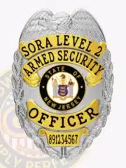 Silver metal SORA Level 2 armed security badge with gold panels, showing an eagle design at the top, bold black lettering on gold banners, official New Jersey state seal in the center, and a safety pin fastener for secure wear.