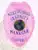 Allied Universal Security Manager badge in custom BCAM pink color with detailed eagle at the top, blue text panels, a globe emblem in the center, and safety pin attachment on the back.