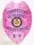 Detailed photo of a bright pink law enforcement badge for Wayne County Corrections, showing an eagle crest on top, pink banners with blue lettering for "Corrections Wayne County Sheriff's Office K-9," the Arkansas state emblem in the center, and a safety pin on the back.