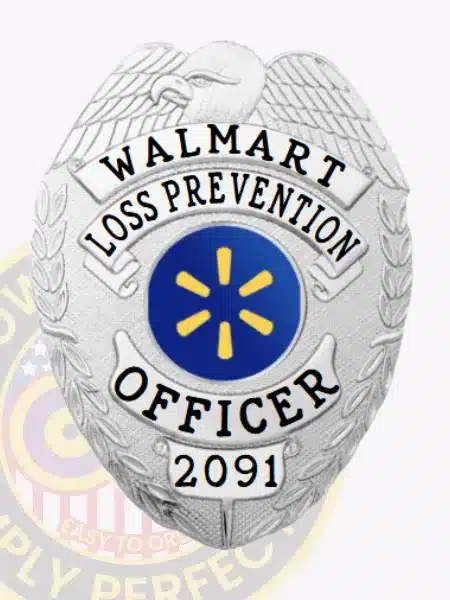 Close-up of a custom silver metal Walmart Loss Prevention Officer badge with an eagle at the top, featuring black text reading "WALMART LOSS PREVENTION OFFICER 2091," and a central blue Walmart logo, attached with a safety pin for secure wear.