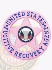 Custom pink metal badge for Fugitive Recovery Agents, formed as a 5-point star within a circle that reads 'United States Fugitive Recovery Agent.' The center seal shows American flags and the phrase 'Liberty & Justice For All.' Includes a safety pin attachment for wearing.