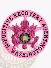 Close-up of a custom pink metal badge for Washington Fugitive Recovery Agents, featuring a 5-point star design with a detailed eagle emblem at the center, inscribed with "FUGITIVE RECOVERY AGENT" and "WASHINGTON," and a safety pin attachment on the back.