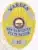 Oval-shaped metal badge in gold with silver panels and blue letters reading "Warden New Hampshire State Prison" along with the number "10." The center displays the official New Hampshire state seal, with a safety pin for secure attachment.