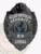Front view of an Allied Universal custom black metal K9 badge featuring an embossed bear figure at the top, a globe graphic in blue and green center, clear white text stating "Security K9," and a visible safety pin attachment for easy fastening.