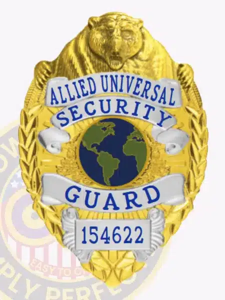 Custom gold bear top metal badge with silver panels for Allied Universal Security, labeled 'Guard' with blue lettering, featuring a central globe emblem and safety pin attachment.
