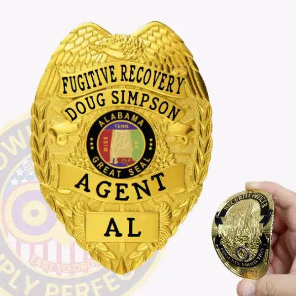 Detailed view of a custom eagle top flex badge for fugitive recovery agent with velcro attachment, shaped like a shield with an eagle at the crest, engraved with "Fugitive Recovery Agent AL," and a colorful Alabama Great Seal in the center.