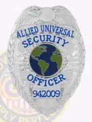 Professional silver eagle metal officer badge for Allied Universal security featuring safety pin closure