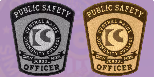 University public safety officer patches displayed in subdued colors