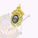Cop Silver Gold 5 Point Star Side. Side view of a silver and gold 5 point star cop badge for a recruit officer.