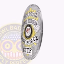 Counter Terrorism Task Force Oval Badge Side. Side view of oval Counter Terrorism Task Force badge in silver and gold.
