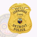 Detroit Police Badge Front. Front view of an eagle top Detroit Police Badge in gold.