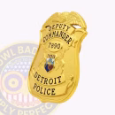 Detroit Police Badge Side. Side view of a gold Detroit Police Badge in an eagle top badge shape.