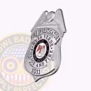 Fire Investigator Eagle Top Badge Side. Side view of a silver eagle top badge for a fire investigator,