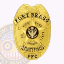 Fort Bragg Security Forces Front. Front view of a Fort Bragg Security Forces gold badge.