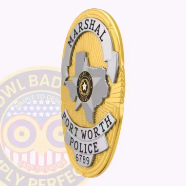 Fort Worth Police Badge Side. Side view of a gold and silver Fort Worth Police Badge in oval shape with Texas and 5 point star in center.