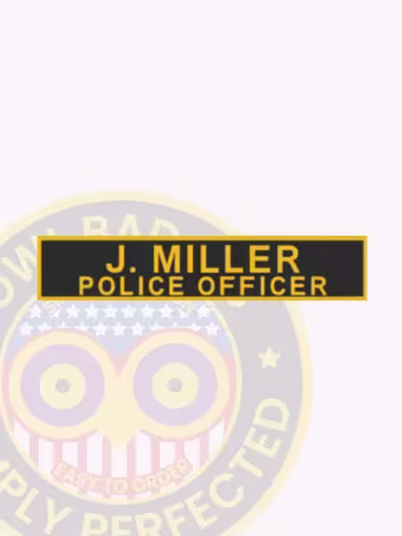 NT700-2 Name Tape PVC Rubber Front. Front view of a PVC Rubber police officer name tape for J. Miller.