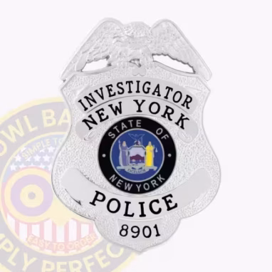 New York Police Badge Front. Front view of an eagle top New York City Police Badge in silver.