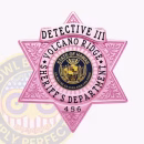 Pink 6 Point Star Badge for Sheriff's Department Front. Front view of a 6 point star badge in pink for Volcano Ridge Sheriff's Department.
