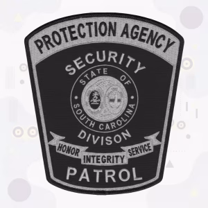 Black and silver security patrol shield patch with a state seal