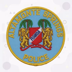 Blue round police patch with a city seal