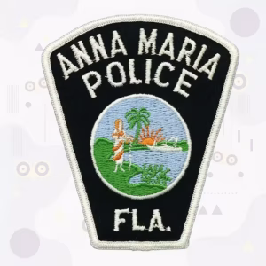 Tombstone police patch with a tropical beach sunrise
