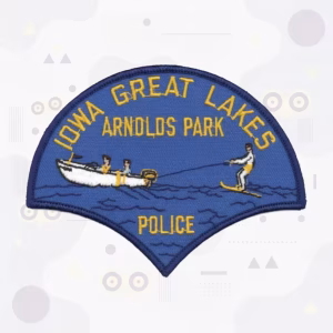 Fan-shaped police patch with a water skier and motorboat