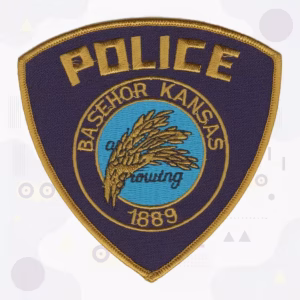 Police shield patch with golden wheat sheaves