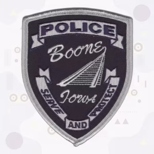 Police shield patch with a railroad trestle bridge