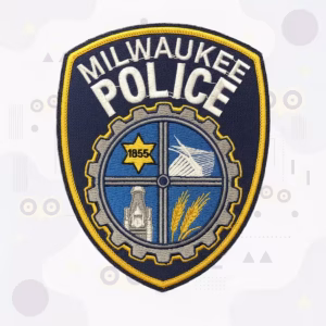 Navy embroidered police shield patch with a city seal