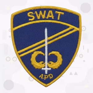 Swat shield patch with a silver sword and airborne wings