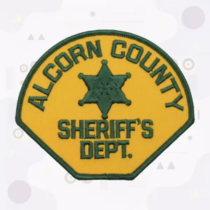 Sheriff patch with a green six-point star on gold twill