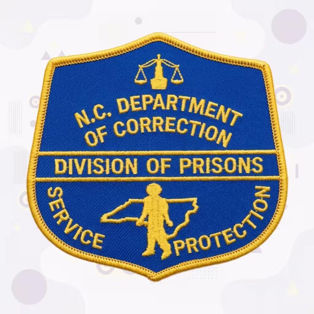 Blue and Gold North Carolina Department of Correction Patch with the Division of Prisons