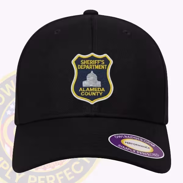 Custom structured cap with an applied gold county sheriff patch