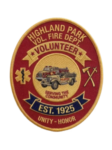 Volunteer fire department patch with a vintage fire truck