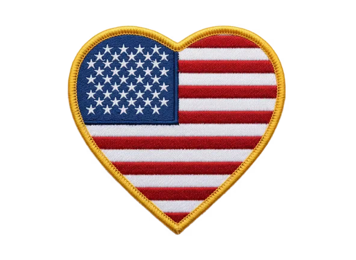 Heart-shaped American flag patch with a gold border