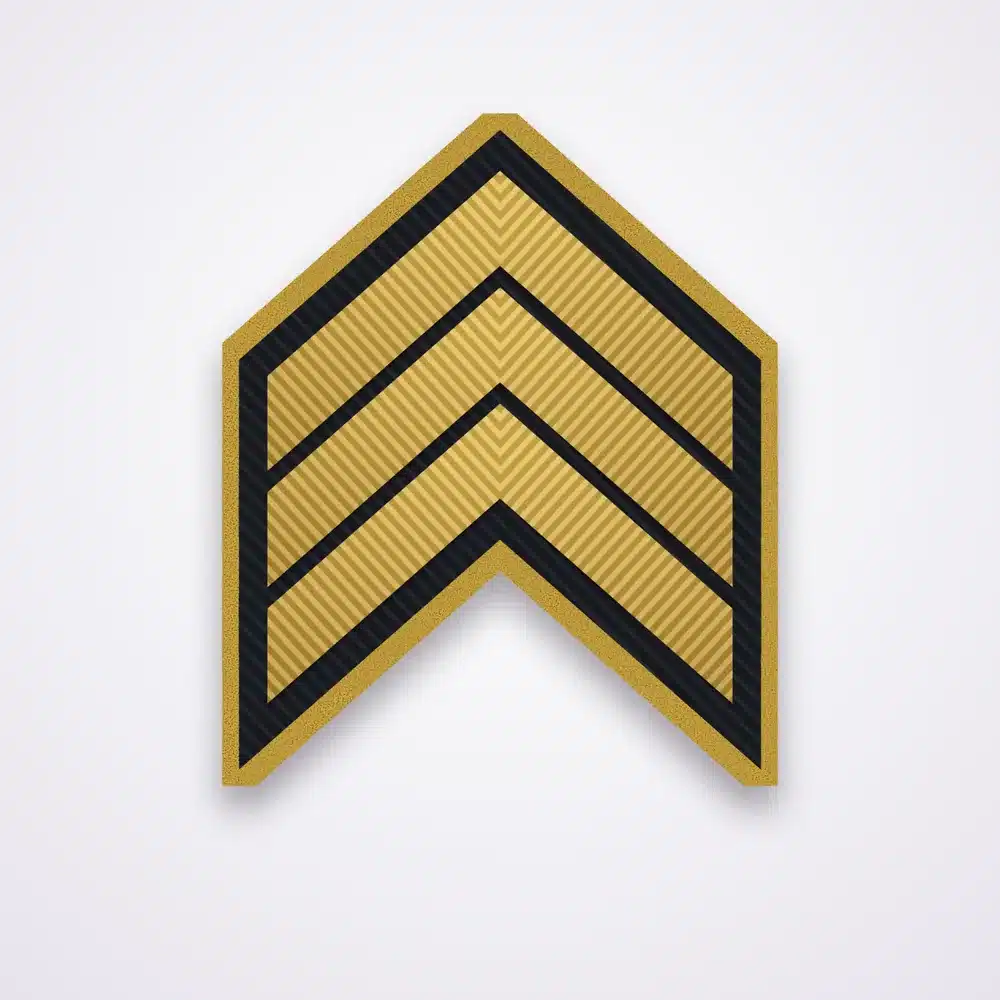 Illustration of a three-chevron sergeant rank patch in gold thread on black twill