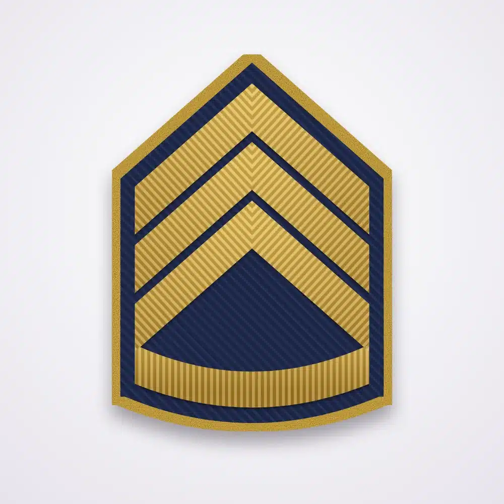 Sergeant Patches 46 Illustration of a three-chevron sergeant patch with one rocker in gold thread on navy twill